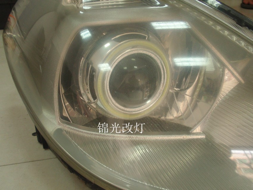日產(chǎn)NISSAN騏達TIIDA改裝氙氣燈雙光透鏡超光亮LED天使眼光圈