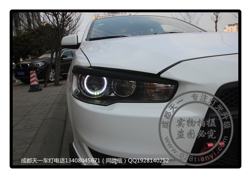 成都翼神車燈改裝升級氙氣燈雙光透鏡天使眼日行燈
