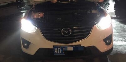 馬自達(dá)cx5燈光升級德國海拉5雙光透鏡   深圳光速車改改燈