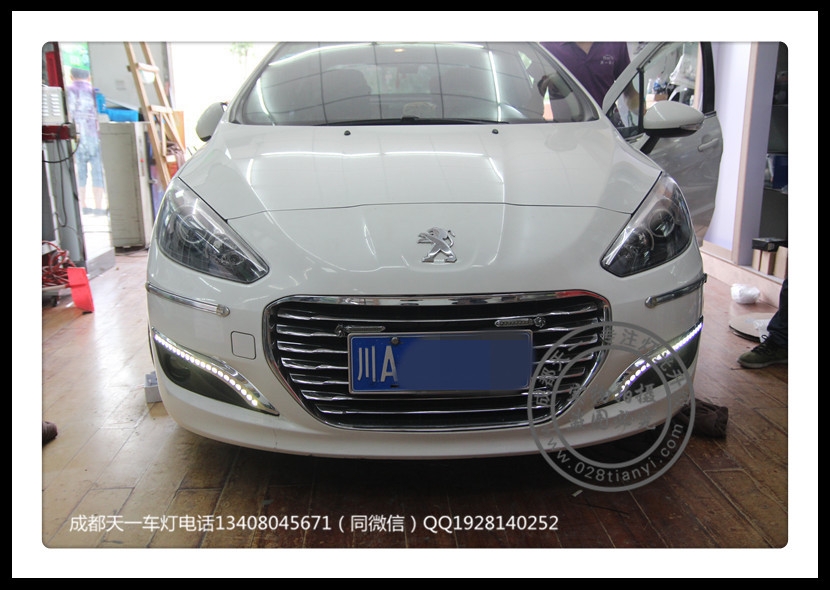 成都標(biāo)志車燈改裝308改裝雙光透鏡日行燈