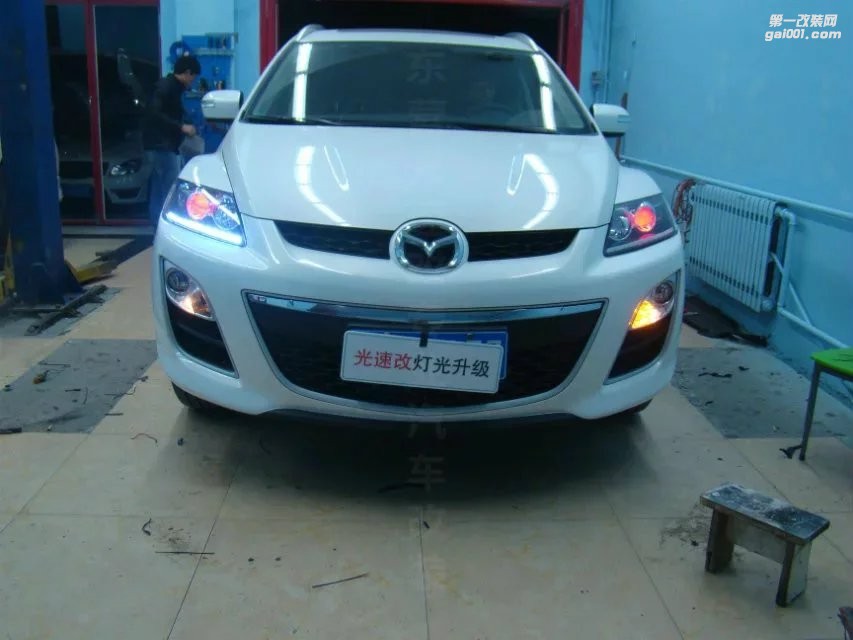 東營(yíng)光速汽車大燈改裝馬自達(dá)CX-7升級(jí)海拉5+惡魔眼