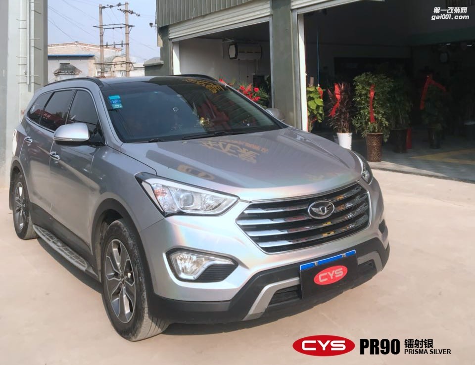 四川成都青羊車衣裳日產(chǎn)奇峻鐳射銀PR90汽車改色貼膜