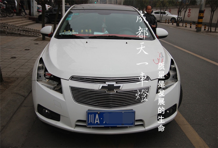 成都科魯茲車燈改裝海拉雙光透鏡進(jìn)口氙氣燈日行燈惡魔眼總成