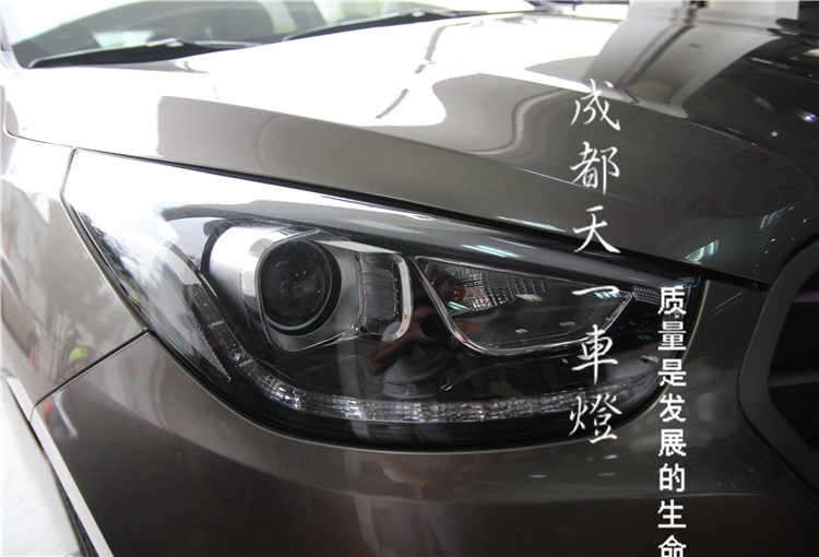 成都現(xiàn)代IX35車燈改裝升級Q5海拉雙光透鏡氙氣燈總成
