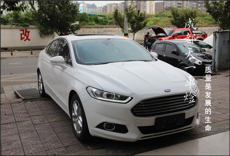 成都福特新蒙迪歐改車燈|蒙迪歐車燈改裝海拉雙光透鏡歐司朗氙氣燈日行燈