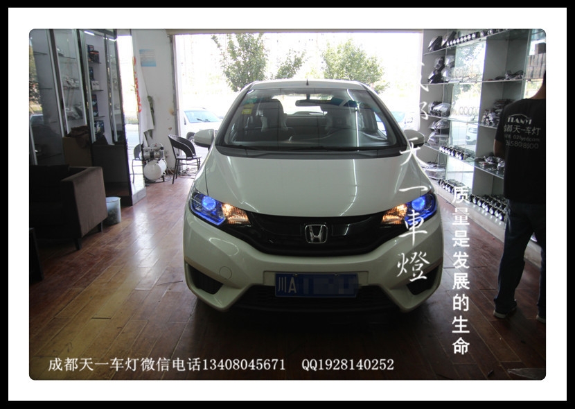 成都新飛度改燈|成都飛度車(chē)燈改裝氙氣燈雙光透鏡日行燈