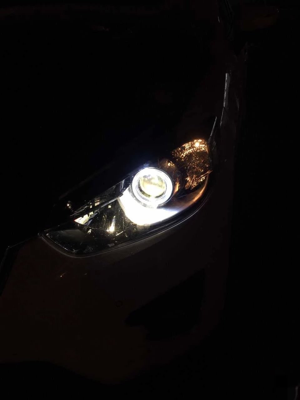馬自達(dá)cx5燈光升級德國海拉5雙光透鏡   深圳光速車改改燈