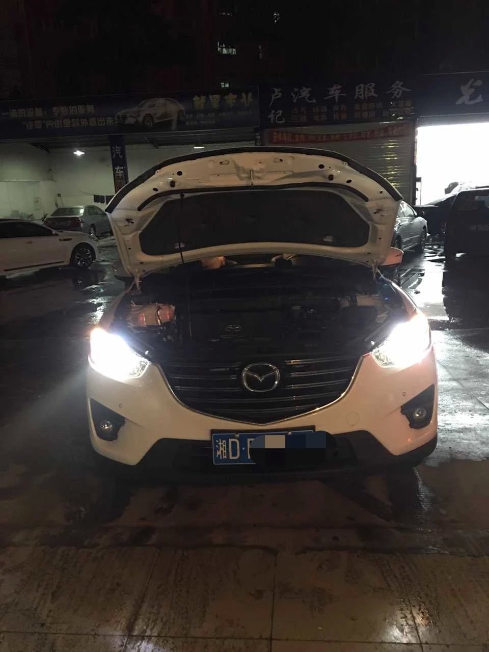馬自達(dá)cx5燈光升級德國海拉5雙光透鏡   深圳光速車改改燈