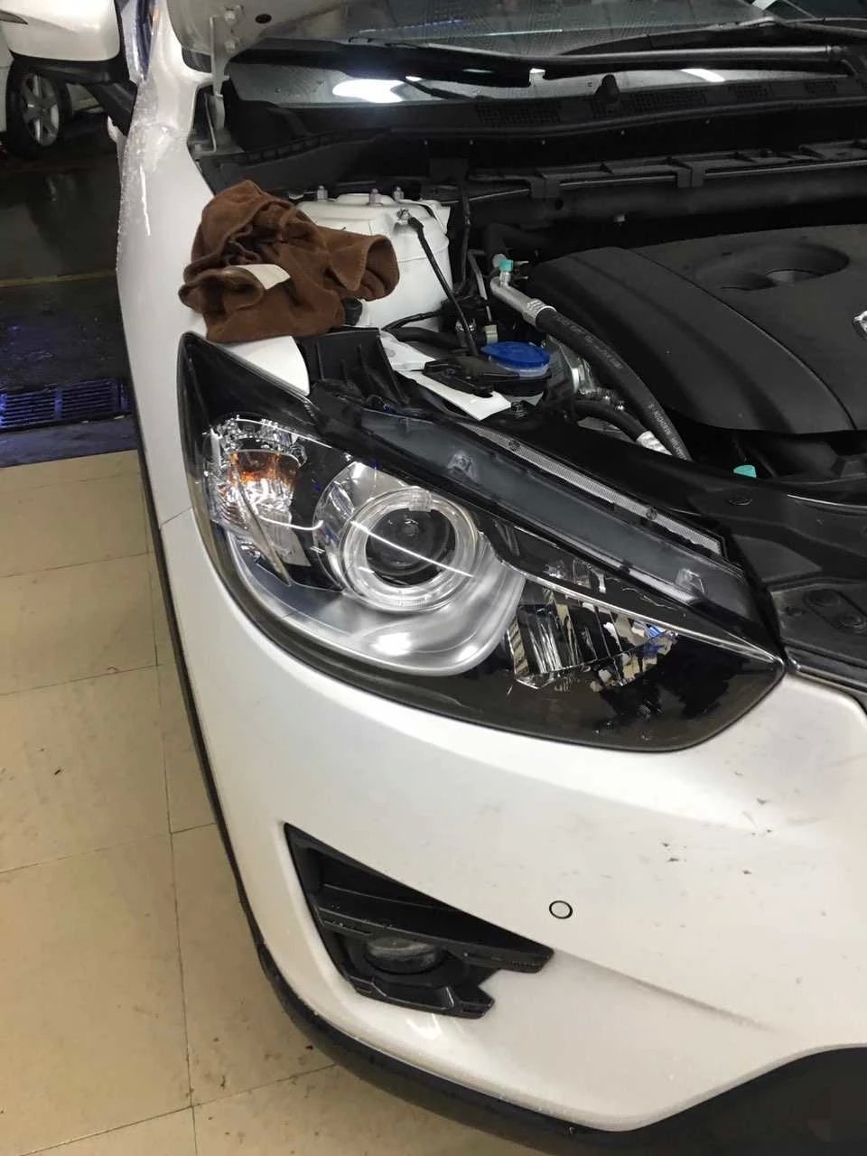 馬自達(dá)cx5燈光升級德國海拉5雙光透鏡   深圳光速車改改燈