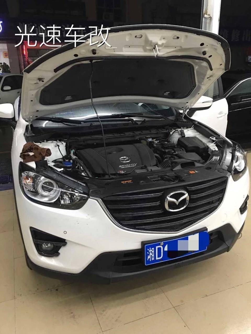 馬自達(dá)cx5燈光升級德國海拉5雙光透鏡   深圳光速車改改燈