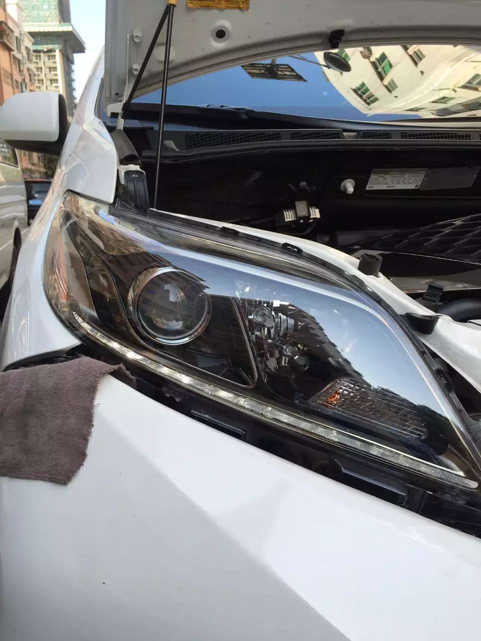 美規(guī)mpv塞納車燈升級海拉5雙光透鏡    深圳光速車改改燈