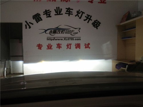 郴州小雷改灯 郴州宝马7系车灯升级海拉4双光透镜作业。