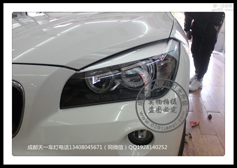 成都寶馬X1改車燈改裝氙氣燈海拉雙光透鏡LED天使眼