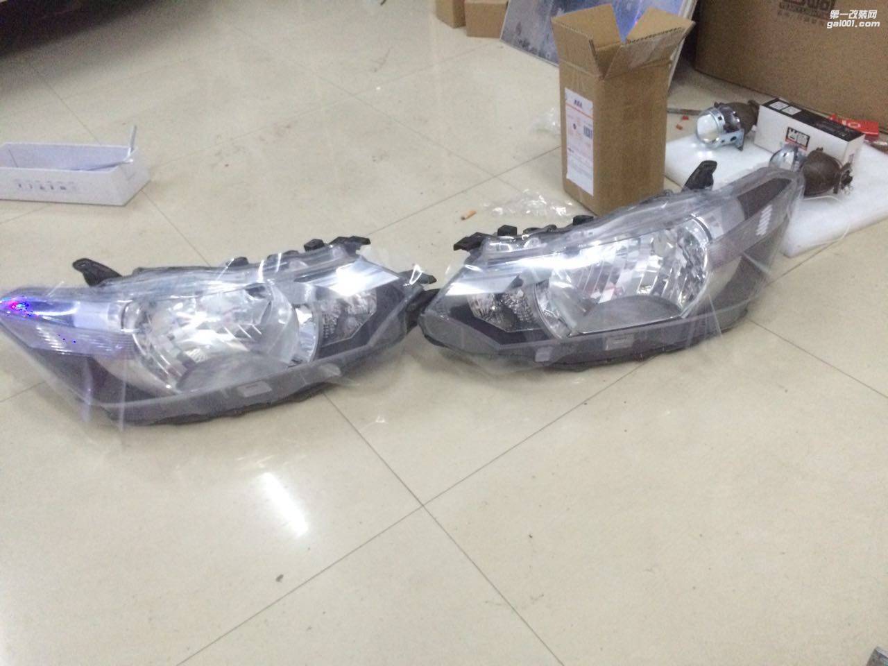 河源車燈改裝河源新光源車燈升級(jí)豐田威馳Q5雙光透鏡+巖崎燈泡