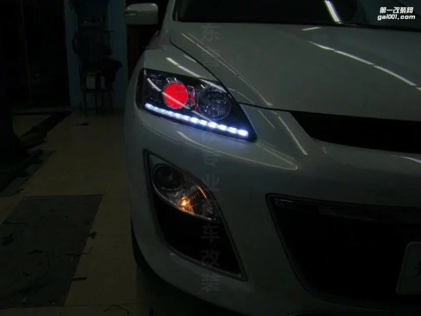 東營(yíng)光速汽車大燈改裝馬自達(dá)CX-7升級(jí)海拉5+惡魔眼
