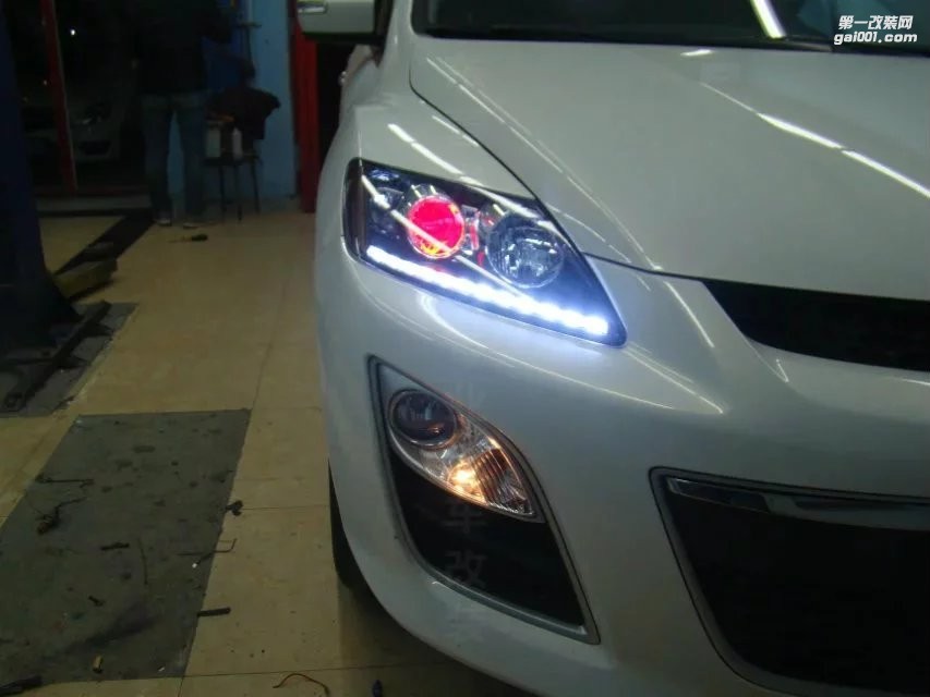 東營(yíng)光速汽車大燈改裝馬自達(dá)CX-7升級(jí)海拉5+惡魔眼