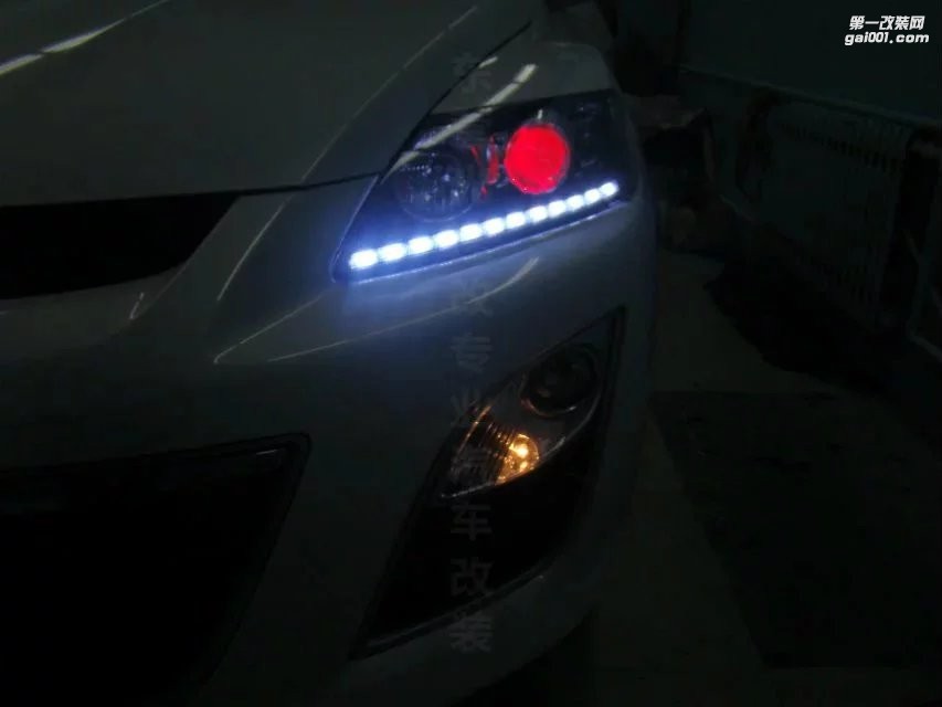 東營(yíng)光速汽車大燈改裝馬自達(dá)CX-7升級(jí)海拉5+惡魔眼