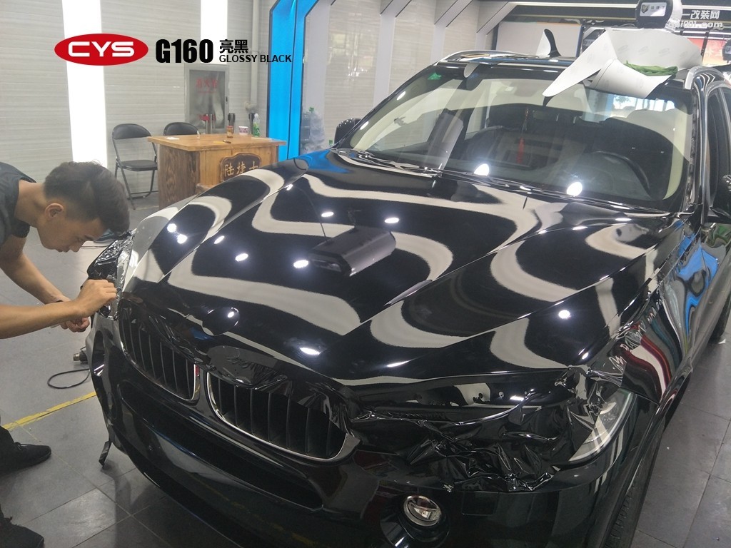 四川成都車衣裳寶馬X5亮黑汽車改色貼膜