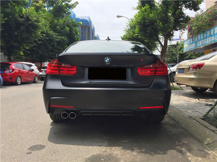 成都銳行寶馬320i改裝AN MP大包圍全車(chē)電光黑改色膜