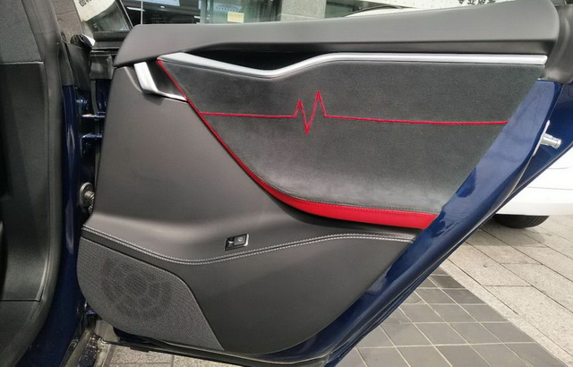 重慶汽車(chē)音響改裝哪家好？重慶渝大昌特斯拉Model S汽車(chē)音響改裝意大利史泰格和德國(guó)零點(diǎn)DSP功放處理器