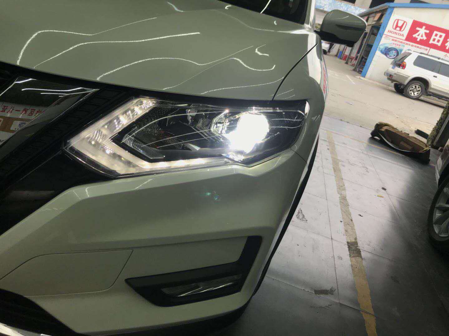 新款奇駿改裝雙光透鏡新鄉(xiāng)探路者改燈專業(yè)汽車燈光升級(jí)