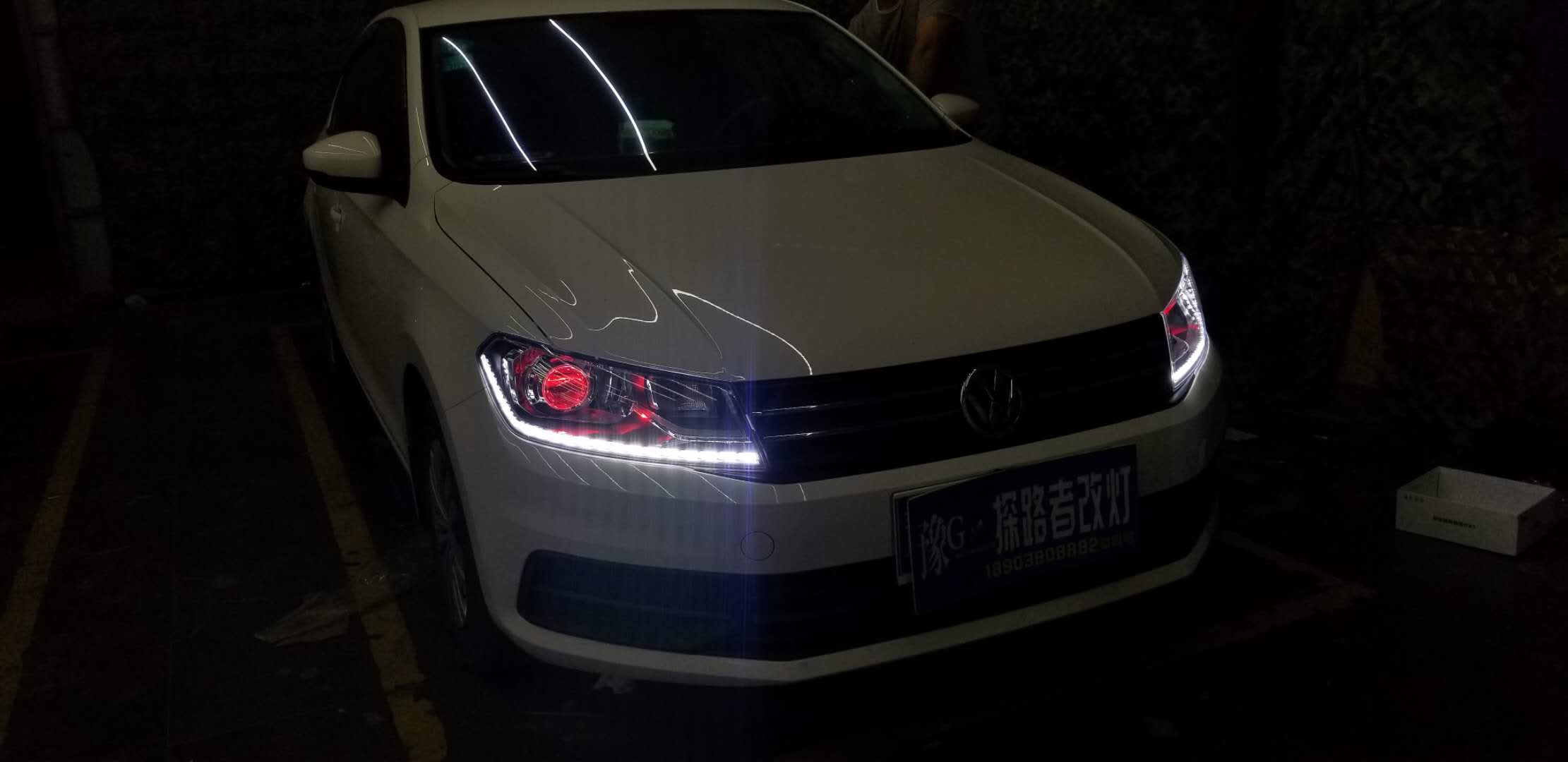 桑塔納改裝氙氣燈加裝惡魔眼新鄉(xiāng)探路者改燈專業(yè)汽車燈光升級