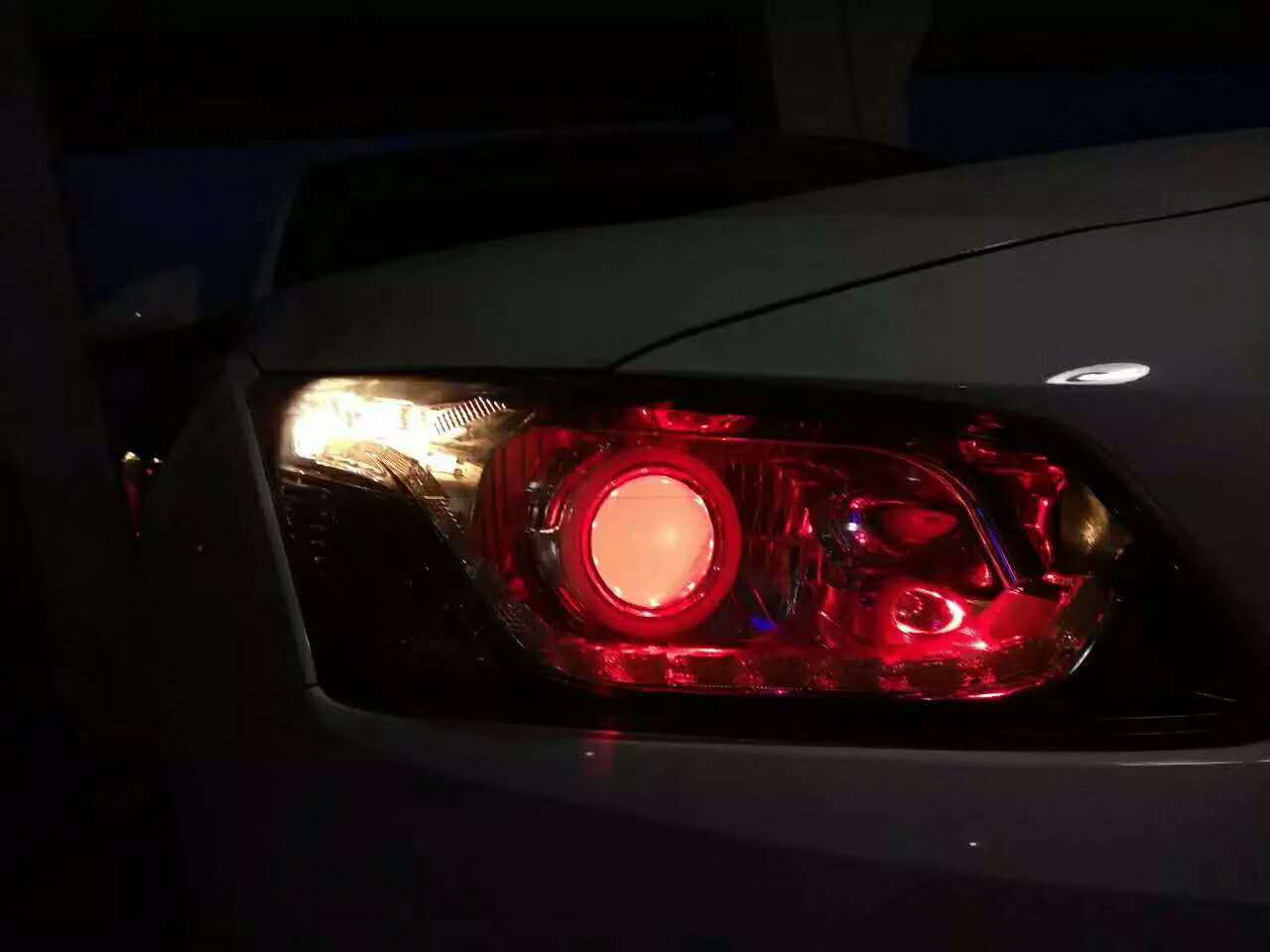 科鲁兹升级双光透镜加装红色恶魔眼新乡探路者改灯专业解决汽车灯光问题
