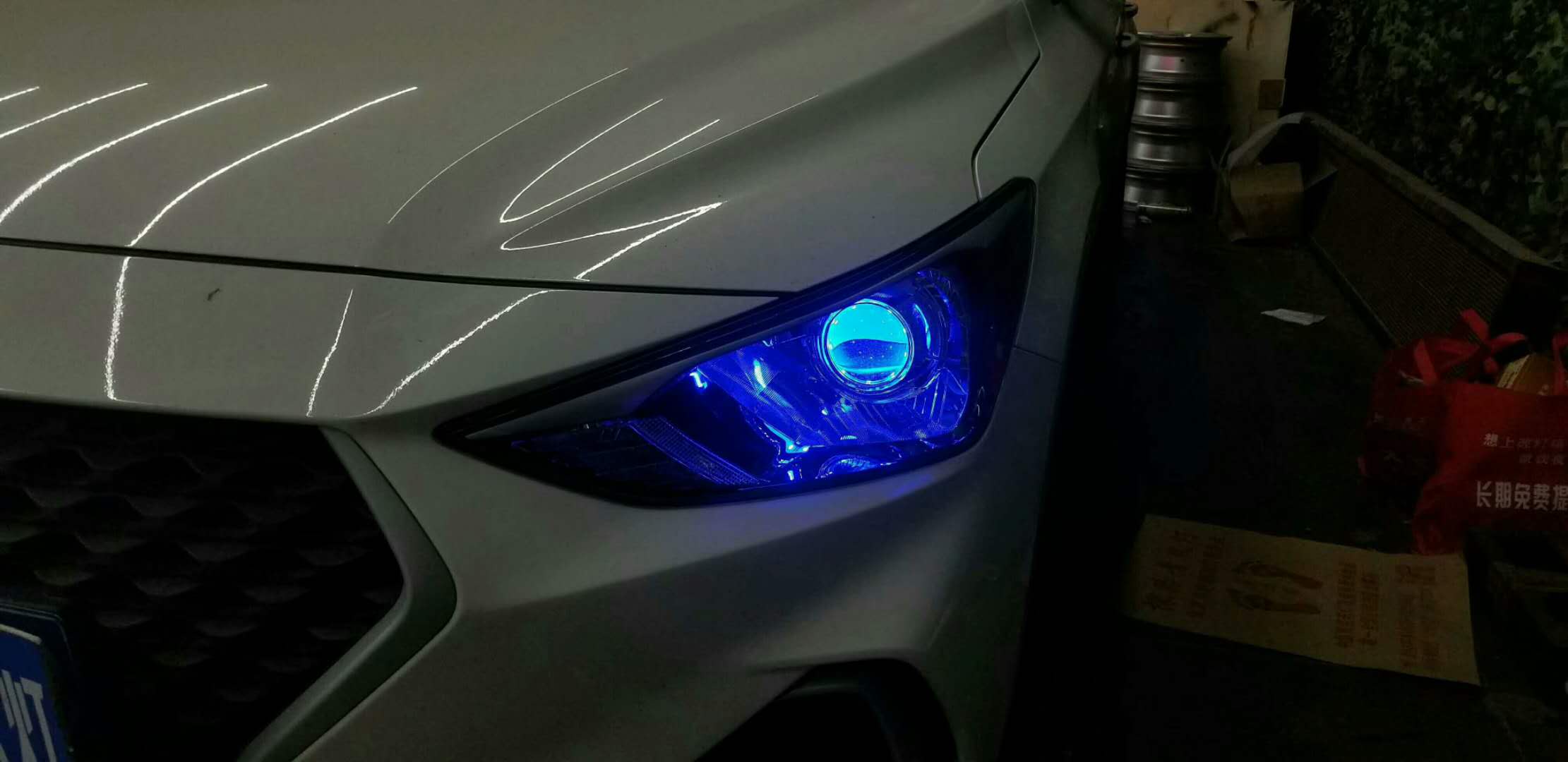 新乡悦动改装LED透镜加装恶魔眼探路者改灯专业汽车灯光升级