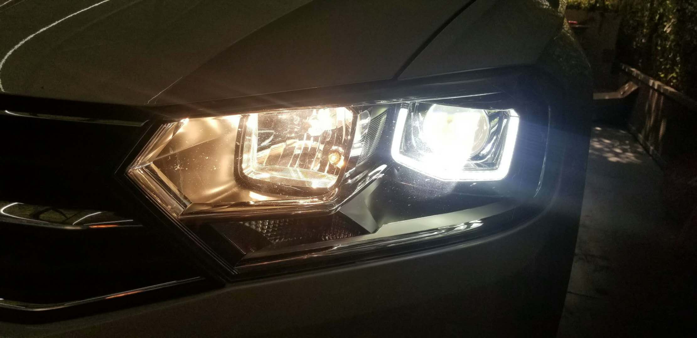 新乡探路者改灯专业改装LED透镜氙气灯宝来升级汽车大灯总成